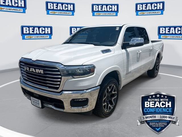 2025 RAM 1500 Laramie in Bright White Clea — front three-quarter view