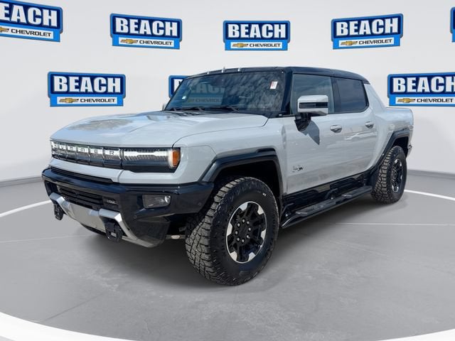 2024 GMC HUMMER EV Pickup 3X in Meteorite Metallic (Grey) — front three-quarter view