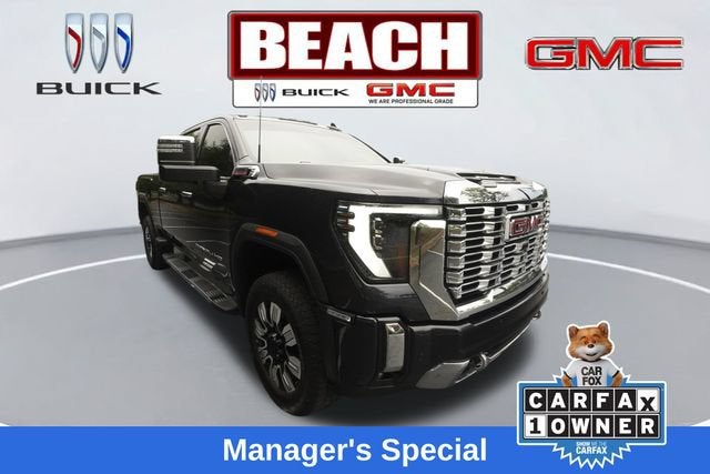2024 GMC Sierra 2500 HD Denali in Titanium Rush Metallic — front three-quarter view