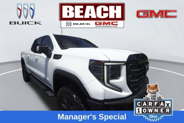 2024 GMC Sierra 1500 AT4X in Summit White — front three-quarter view