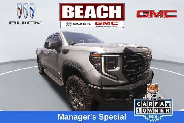 2026 GMC Sierra 1500 AT4X in Sterling Metallic — front three-quarter view