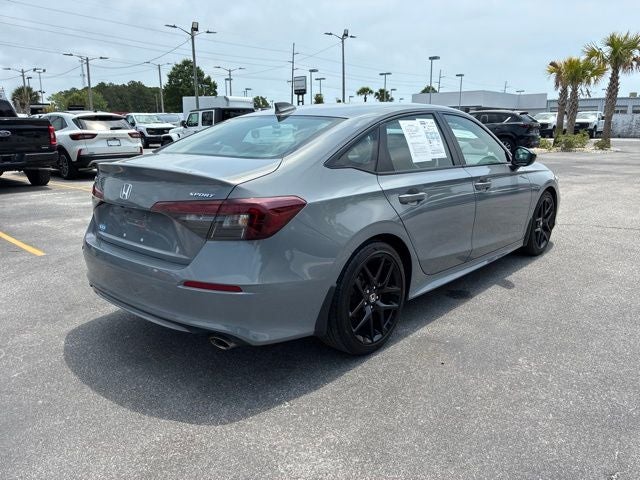 2025 Honda Civic — rear three-quarter view