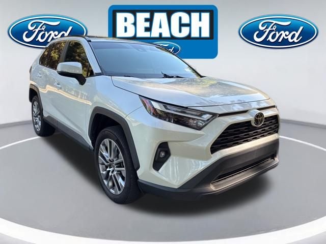 2022 Toyota RAV4 XLE Premium in Blizzard Pearl — front three-quarter view