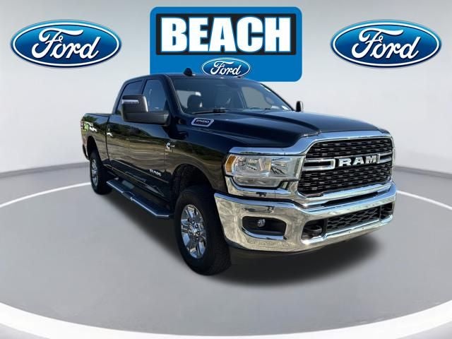 2024 RAM 2500 Big Horn in Diamond Black Crystal Pearlcoat — front three-quarter view