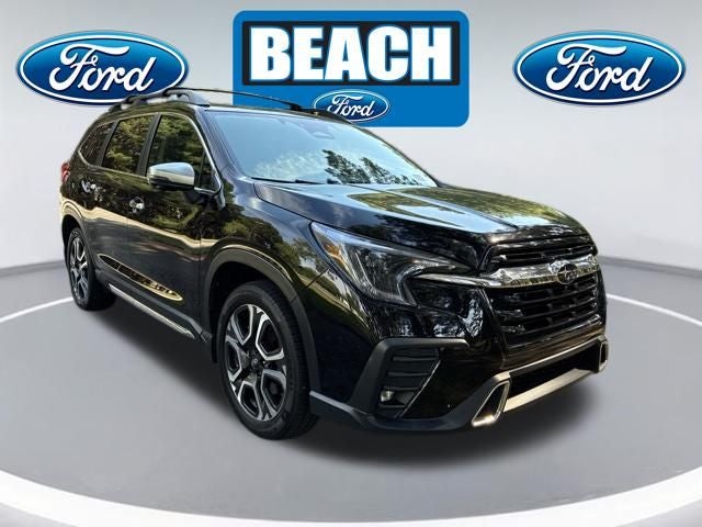 2023 Subaru Ascent Touring in Crystal Black Silica — front three-quarter view